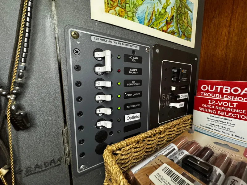 Slide: The Image of Interior of a 1994 Beneteau 40 sailboat with wooden cabinetry and stairs. - 59