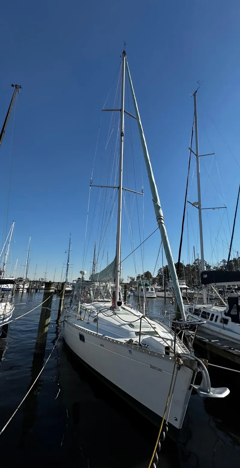 Slide: The Image of 1994 Beneteau 40 sailboat docked, for sale at marina. - 6