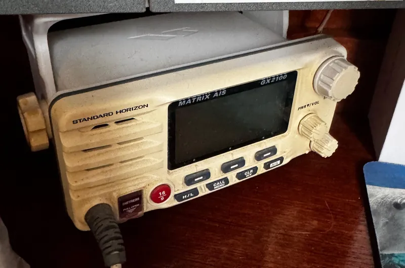 Slide: The Image of Starboard aft cabin with bed and storage shelves. - 62