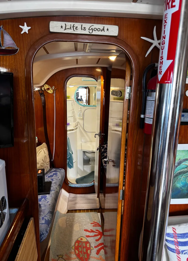 Slide: The Image of Aft port side cabin with double bed. - 69
