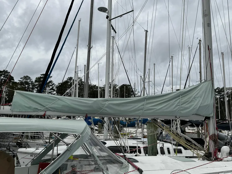 Slide: The Image of Cockpit of a 1994 Beneteau 40 sailboat with navigation equipment and seating. - 7