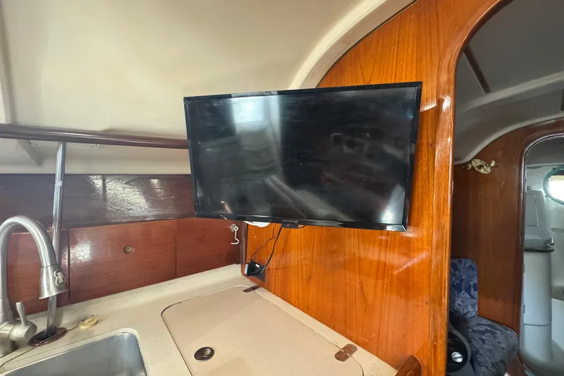 Slide: The Image of mounted TV , Insignia brand - 80