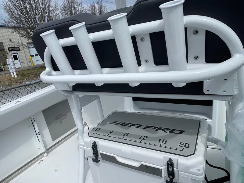 Slide: The Image of 2025 Sea Pro 222 Center Console boat with rod holders and storage compartment. - 13