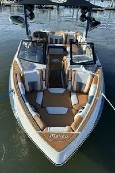 Slide: The Image of 2023 Malibu Wakesetter 23 LSV boat with luxurious seating and sleek design. - 4