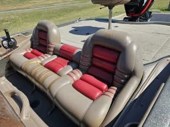 Slide: The Image of 2000 Ranger 520VX boat seats with red and beige upholstery. - 12