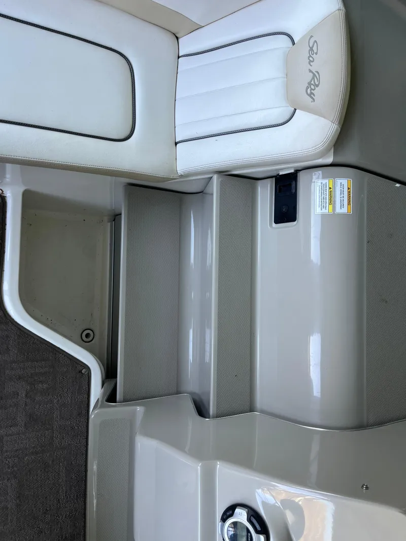 Slide: The Image of 2014 Sea Ray 240 Sundancer interior seating and step detail. - 15