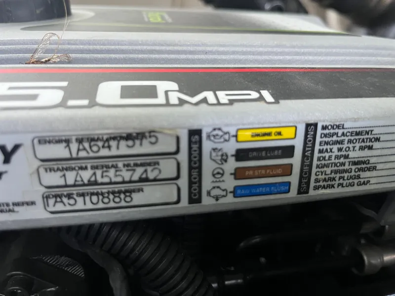 Slide: The Image of Engine specifications label on a 2014 Sea Ray 240 Sundancer boat. - 22