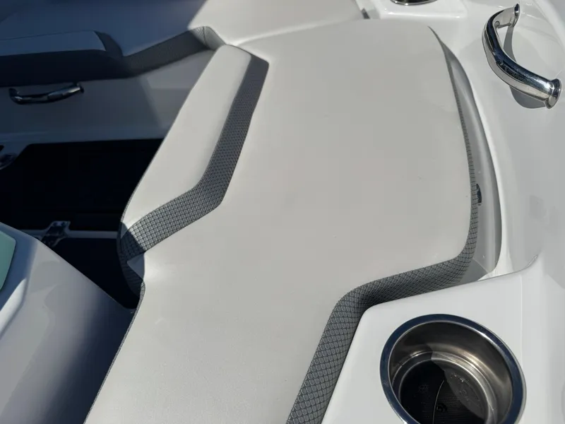 Slide: The Image of 2022 Scarab 165 ID boat interior with sleek seating and cup holder. - 20