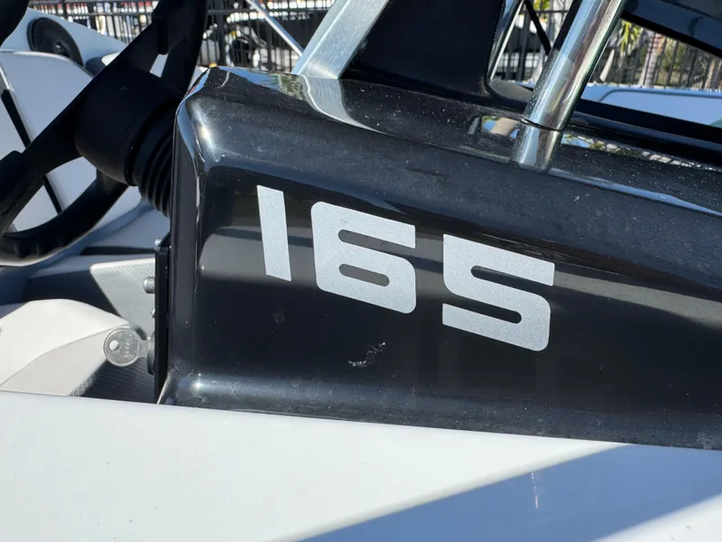 Slide: The Image of 2022 Scarab 165 ID boat detail with model number displayed prominently. - 23