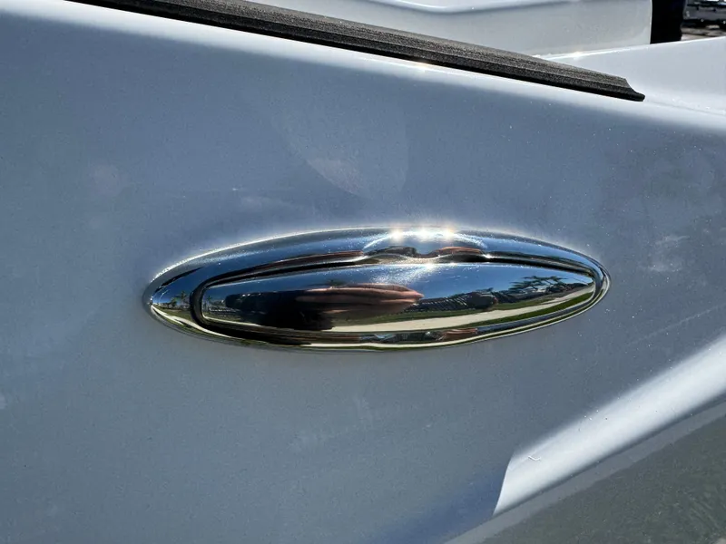 Slide: The Image of Chrome detail on 2022 Scarab 165 ID boat exterior. - 9