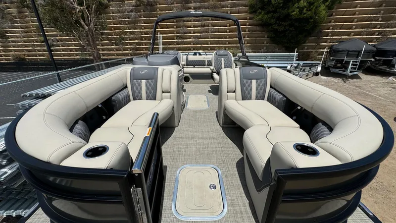 Slide: The Image of 2023 Barletta Lusso 23UC pontoon boat with luxurious seating and modern design. - 16