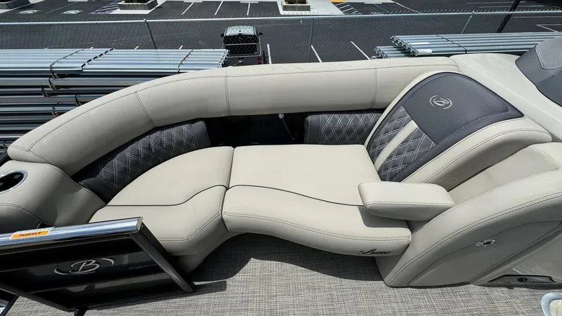 Slide: The Image of 2023 Barletta Lusso 23UC boat interior with luxurious seating and elegant design. - 18
