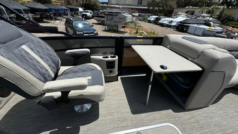 Slide: The Image of 2023 Barletta Lusso 23UC interior with seating and table, showcasing luxury and comfort. - 21