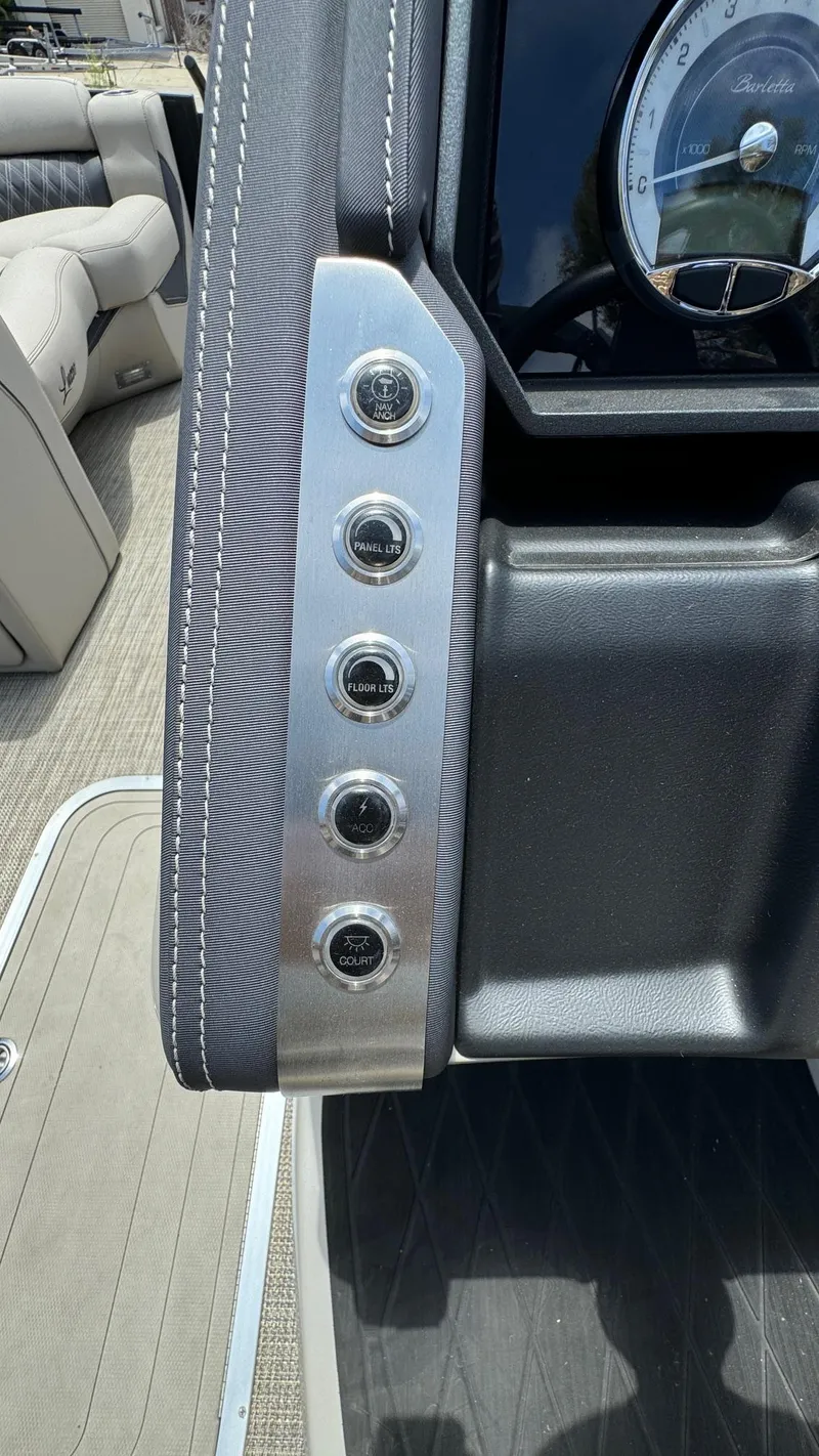Slide: The Image of Control panel of 2023 Barletta Lusso 23UC pontoon boat with five buttons. - 34