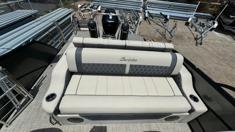 Slide: The Image of 2023 Barletta Lusso 23UC pontoon boat with luxurious seating and cup holders. - 38