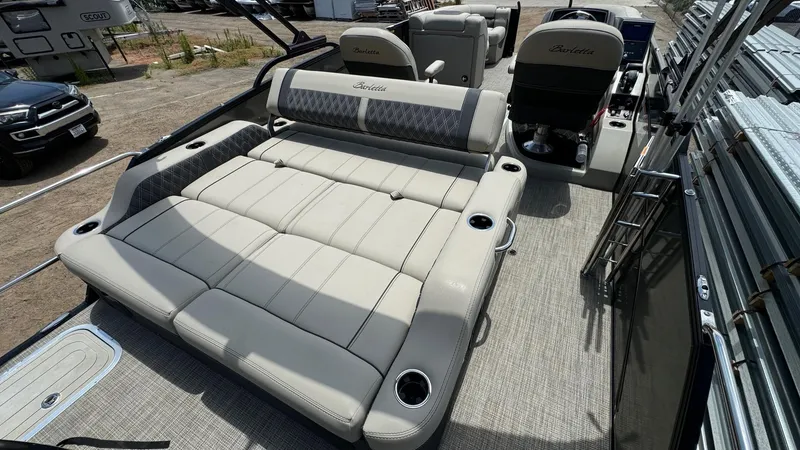 Slide: The Image of 2023 Barletta Lusso 23UC pontoon boat with luxurious seating and cup holders. - 40