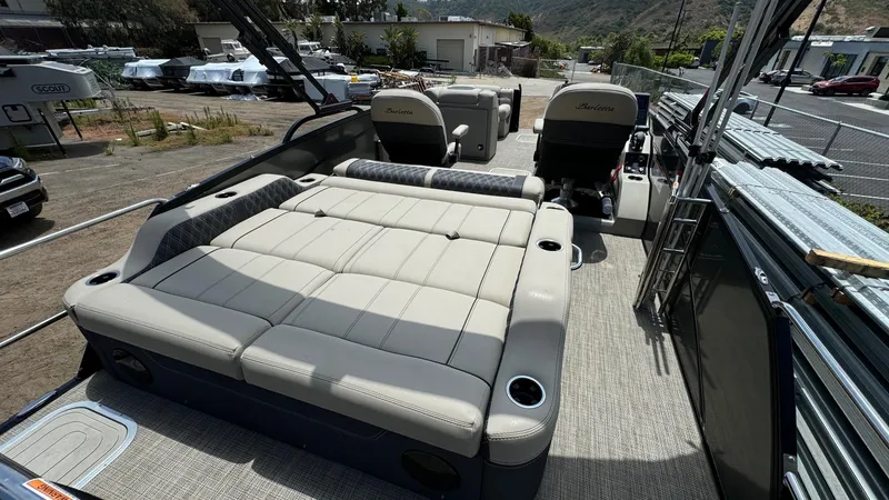 Slide: The Image of 2023 Barletta Lusso 23UC pontoon boat with spacious seating and modern design. - 41