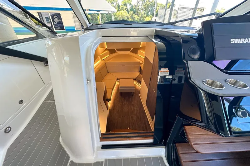 Slide: The Image of Interior view of 2025 Sea Ray Sundancer 370 yacht, featuring modern cabin design. - 23