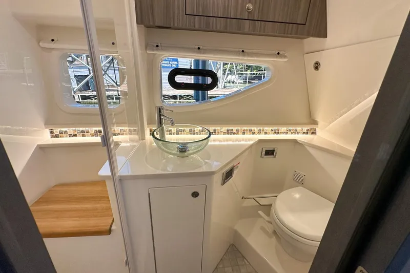 Slide: The Image of Luxurious bathroom interior of 2025 Sea Ray Sundancer 370 yacht with modern fixtures. - 33