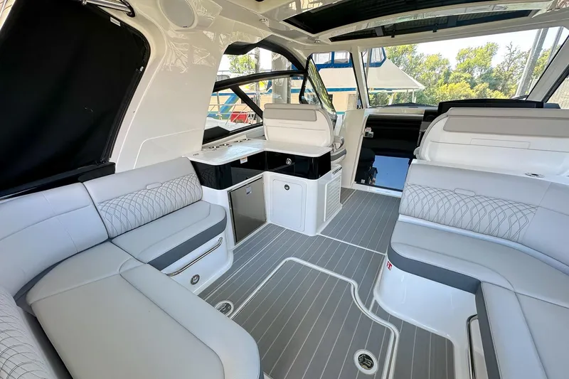 Slide: The Image of Luxurious interior of 2025 Sea Ray Sundancer 370 yacht with elegant seating and modern design. - 5