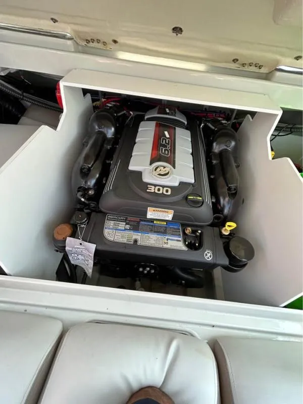 Slide: The Image of 2023 Crownline 240 SS boat engine compartment with 6.2L 300 HP engine. - 18