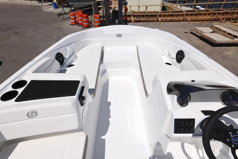 Slide: The Image of 2025 Hurricane SunDeck Sport 185 OB boat interior with seating and steering wheel. - 4