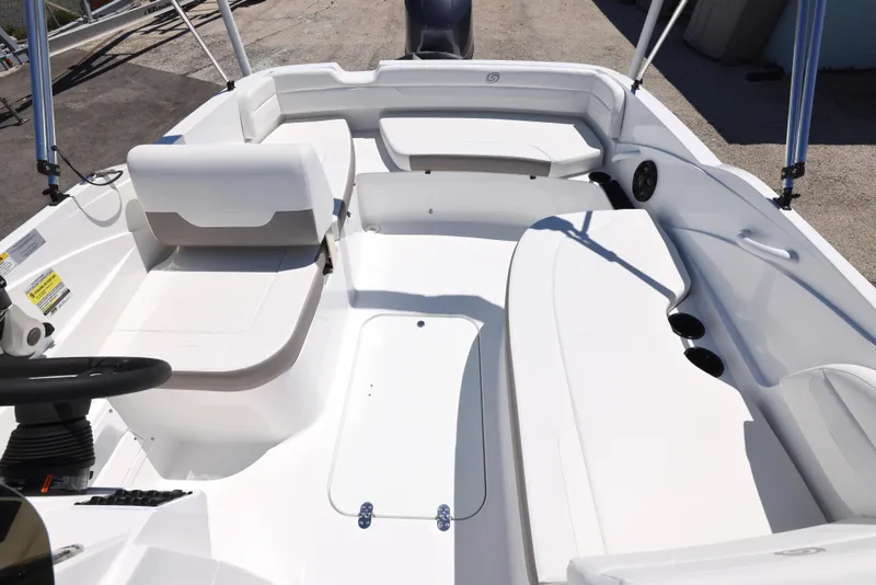 Slide: The Image of 2025 Hurricane SunDeck Sport 185 OB interior with spacious seating and sleek design. - 7