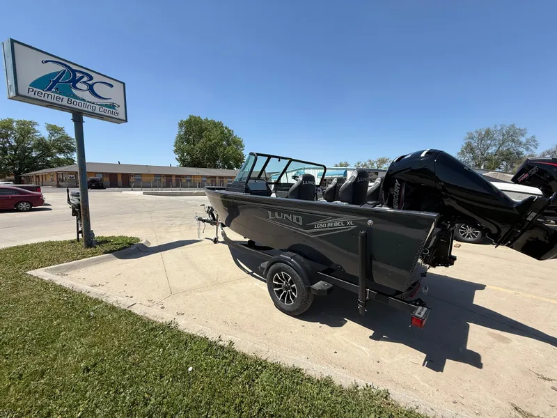 Slide: The Image of 2025 Lund 1650 Rebel XL Sport boat on trailer at Premier Boating Center. - 3