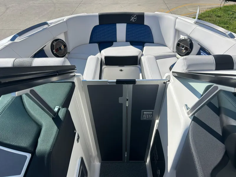 Slide: The Image of 2020 MasterCraft X24 boat interior with plush seating and modern design. - 10