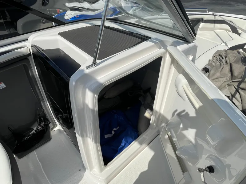 Slide: The Image of 2015 Yamaha AR240 High Output boat interior storage compartment. - 12