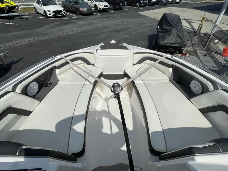 Slide: The Image of 2015 Yamaha AR240 High Output boat interior with spacious seating and speakers. - 14