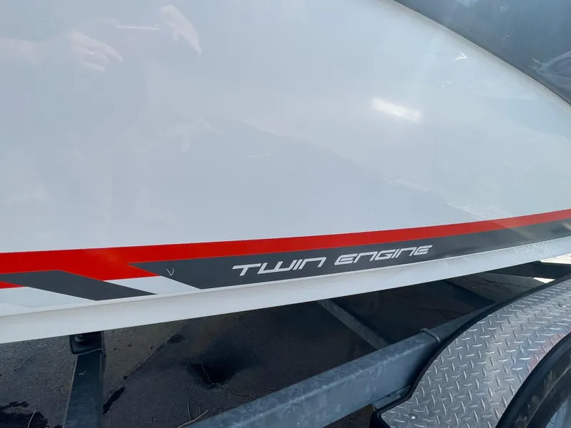 Slide: The Image of 2015 Yamaha AR240 High Output boat with twin engine decal on trailer. - 5