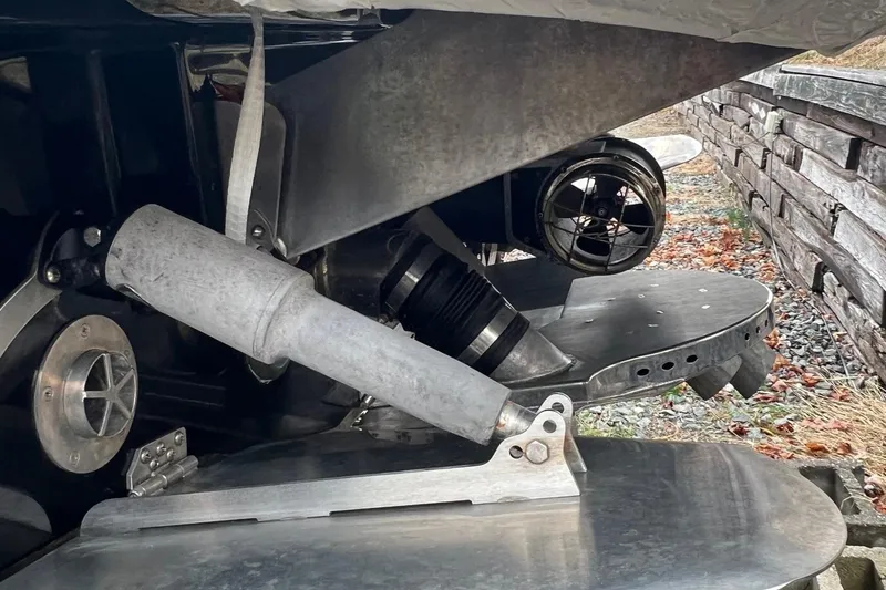 Slide: The Image of 2021 Centurion Ri265 boat underside showing propeller and mechanical components. - 16