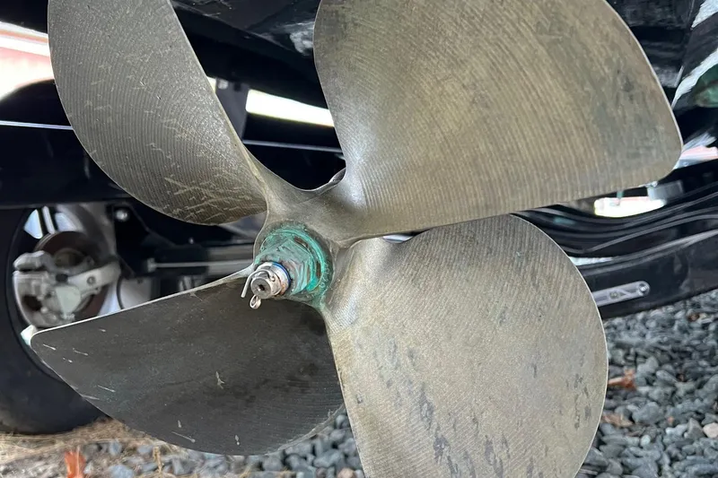 Slide: The Image of Propeller of 2021 Centurion Ri265 boat on gravel surface. - 17