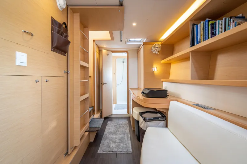 Slide: The Image of Interior of 2017 Lagoon 42 yacht with modern furnishings and ample storage space. - 36