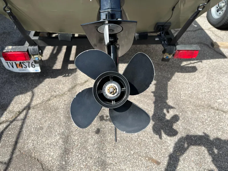 Slide: The Image of Propeller of 2022 Tracker Grizzly 1648 Jon boat on trailer, rear view. - 7