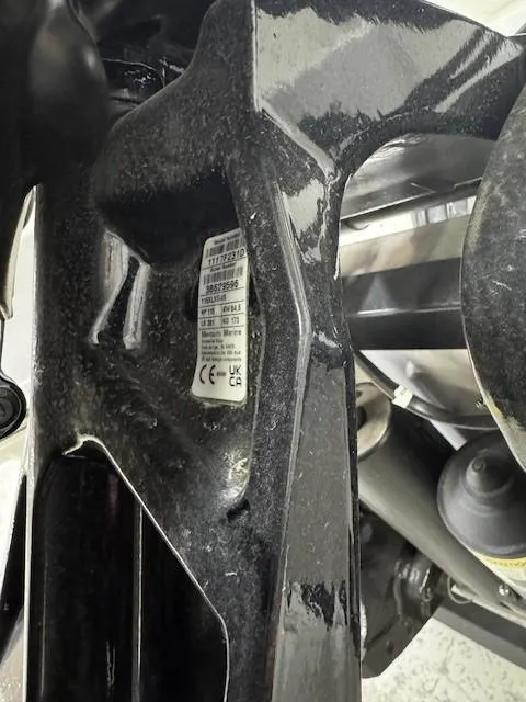 Slide: The Image of 2024 Tahoe 185 S engine compartment with visible label and components. - 12