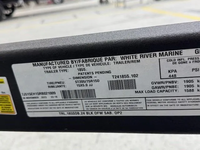 Slide: The Image of Label on 2024 Tahoe 185 S trailer by White River Marine, detailing specifications and capacities. - 13