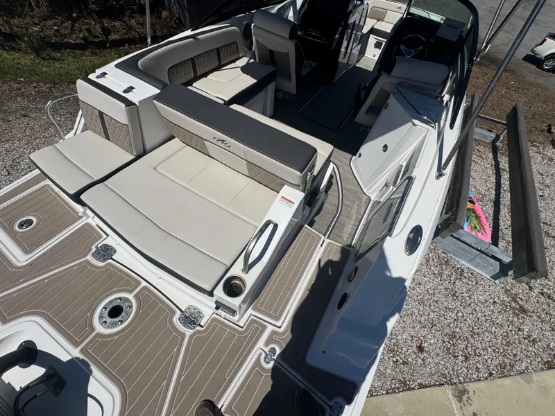 Slide: The Image of 2023 Monterey M-45 boat interior with beige seating and modern design. - 10