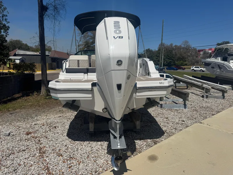 Slide: The Image of 2023 Monterey M-45 boat with powerful V8 engine, displayed outdoors on gravel. - 3