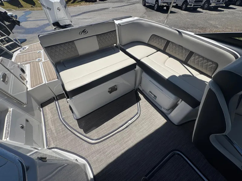 Slide: The Image of 2023 Monterey M-45 boat interior with cushioned seating and modern design. - 7