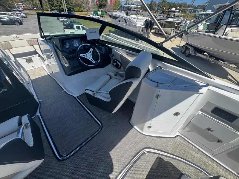 Slide: The Image of 2023 Monterey M-45 boat interior with modern helm and seating. - 8