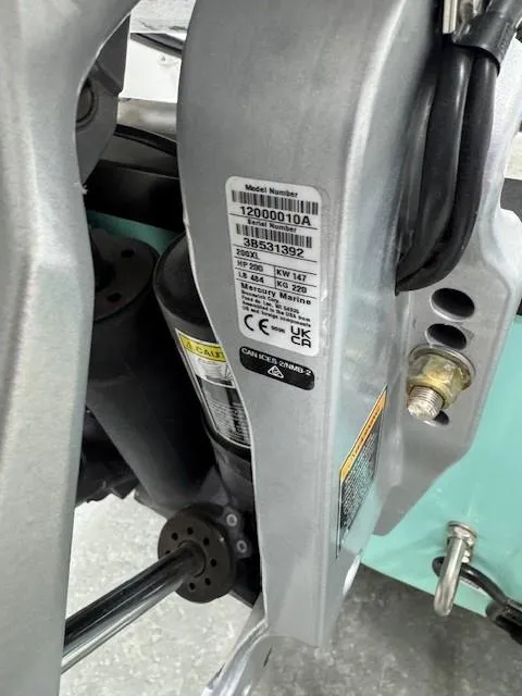 Slide: The Image of Close-up of a 2024 Tahoe 2150 CC engine component with visible model and serial numbers. - 10