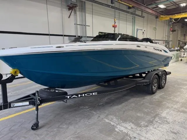 Slide: The Image of 2024 Tahoe 210 S Limited boat on trailer in indoor facility. - 3