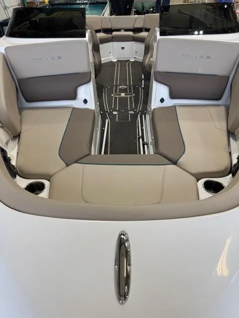Slide: The Image of 2024 Tahoe 210 S Limited boat interior with beige seating and modern design. - 4