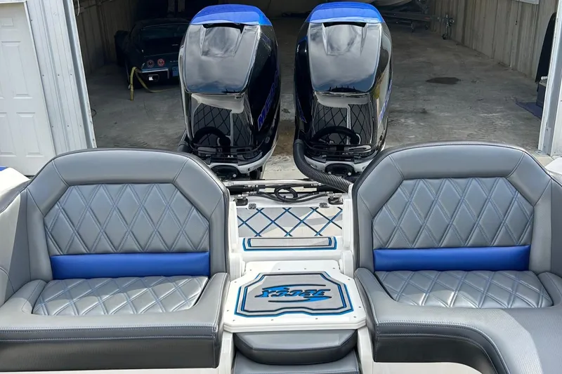 Slide: The Image of 2020 Sunsation 32 CCX boat interior with dual engines and diamond-stitched seating. - 13