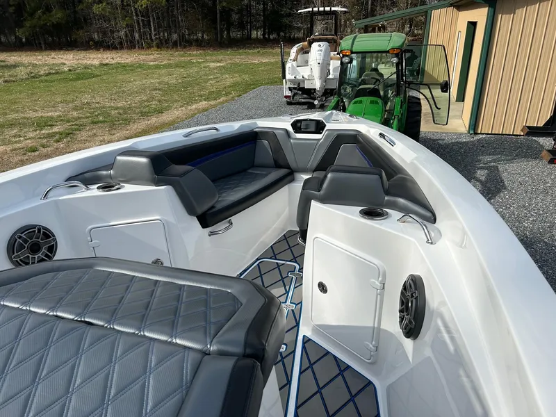 Slide: The Image of 2020 Sunsation 32 CCX boat interior with gray seating and modern design. - 9