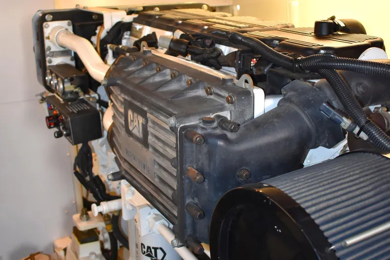 Slide: The Image of Engine of a 2001 West Bay 58 RPH yacht, featuring CAT components. - 72