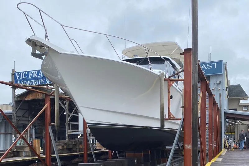 Slide: The Image of 2001 West Bay 58 RPH yacht in dry dock for maintenance. - 78