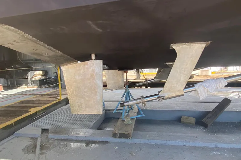 Slide: The Image of Underside view of a 2001 West Bay 58 RPH yacht in dry dock. - 81